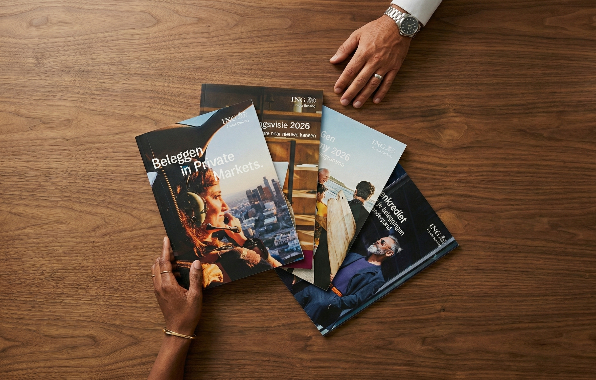 ING Private Banking — financial brochures on wooden table